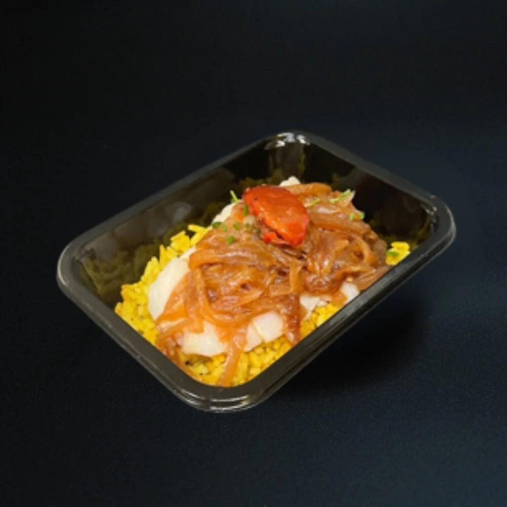 Daurade royale au risotto, oignons confits & tomates confites